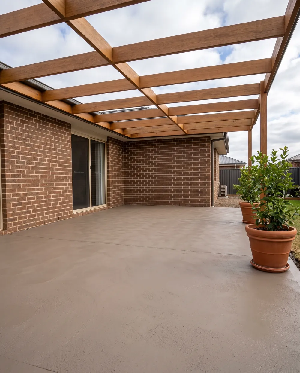 New clean coloured concrete alfresco slab after